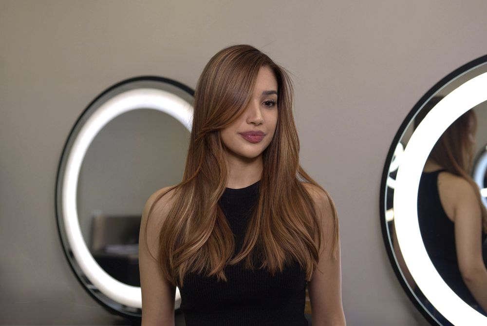 Corte feminino longo em camadas